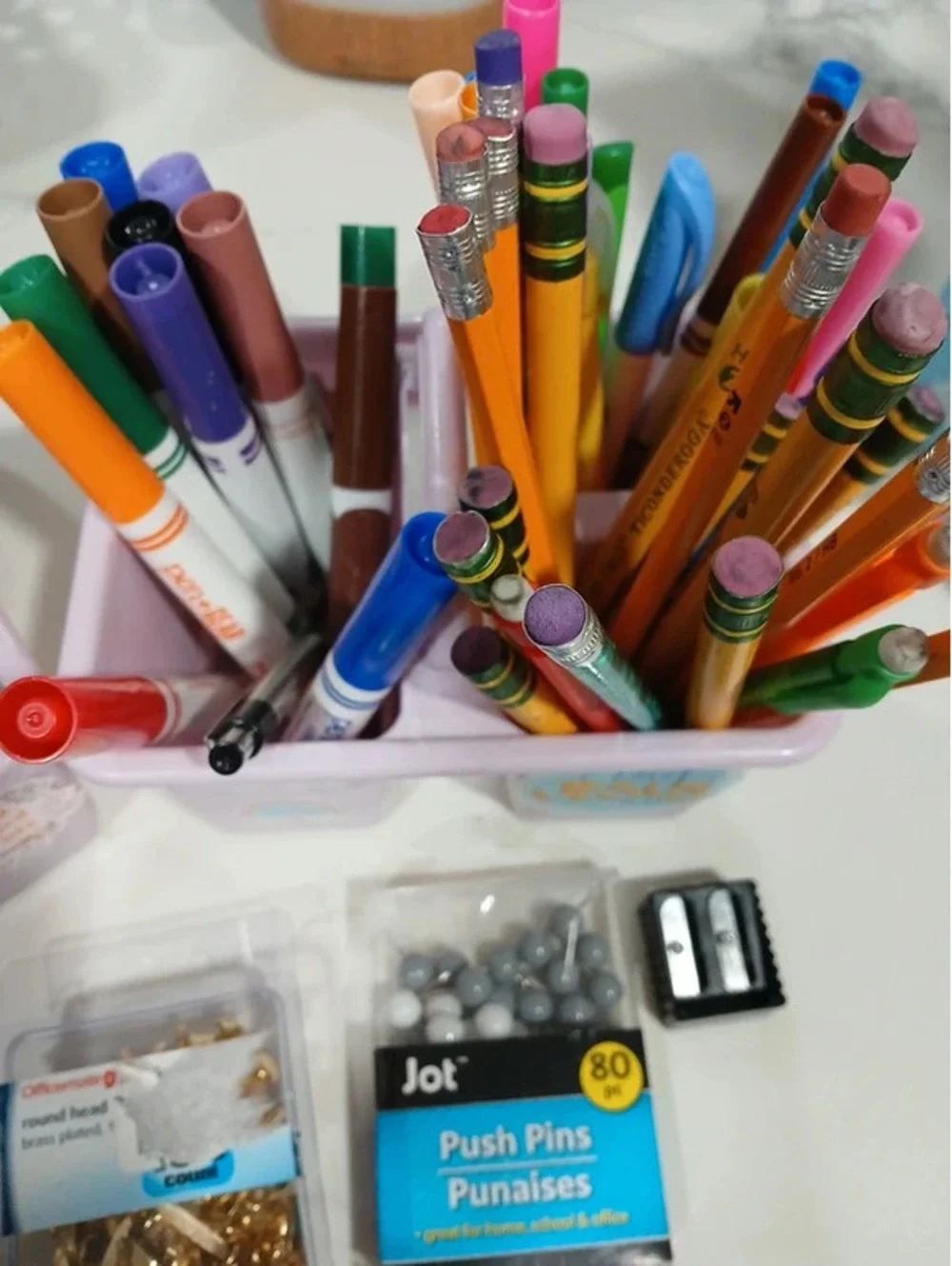 School supplies pencils markers pens pins